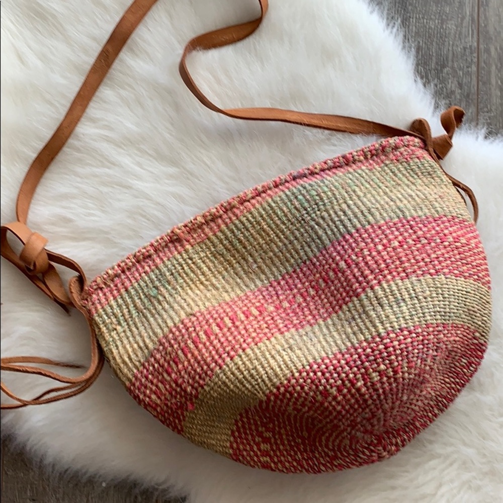 Woven straw and leather bucket bag